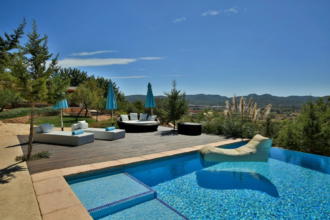 1681312783-Luxury real estate Ibiza to rent villa can Tifany spain property mountain view pool outside.webp